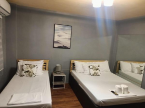 DJCI Apartelle Walk to Robinson & NE Pacific Mall 3 Min to SM Cabanatuan